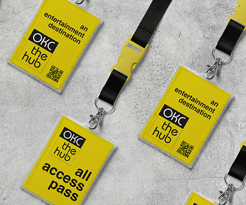 Three yellow all access passes on black lanyards.